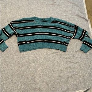 Blue with black and white stripes. Cropped.